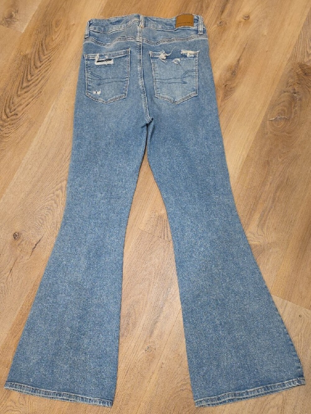 American Eagle Outfitters Light Blue Ripped Flare Jeans - Picture 2 of 4